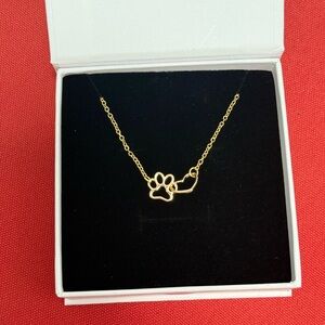 BOGO Sale 2 x $20 
Gold Paw Print Necklace